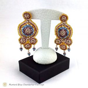 mustard blue chanderlier earrings